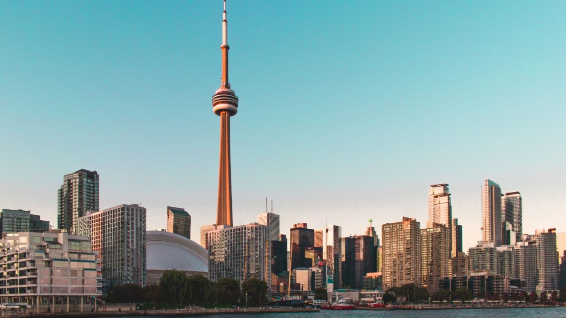Canada home sales edged up in June as CREA cut its 2026 forecast