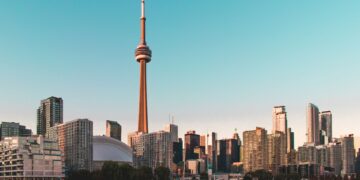 Canada home sales edged up in June as CREA cut its 2026 forecast