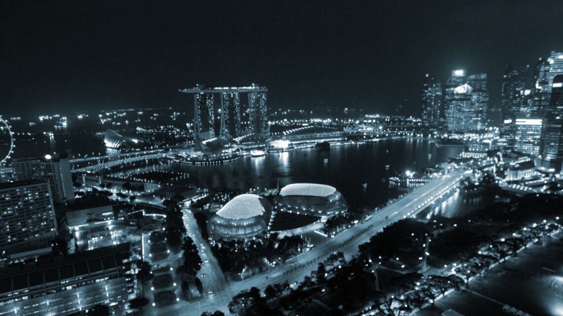 Marina Bay and the Singapore central business district skyline at night