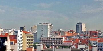 Lisbon rooftop cityscape with red-tile roofs