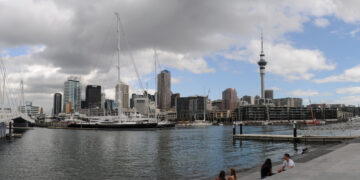 Auckland, New Zealand skyline from Viaduct Harbour — one of the seven countries compared in this work-visa-to-permanent-residency guide