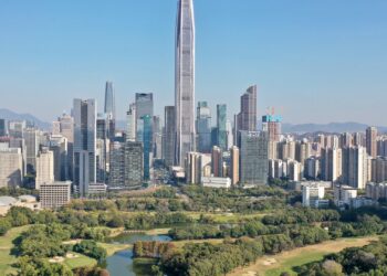 Shenzhen Futian financial district skyline with high-rise residential towers, illustrating China's property and finance policy story