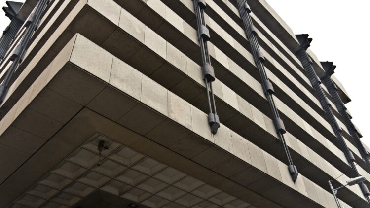 Upward view of the Central Bank of Ireland headquarters building facade in Dublin
