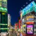 Night-time neon signage street scene in Tokyo's Shinjuku ward