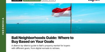 Landmark — Indonesian flag on clifftop viewpoint with seated person, illustrating Bali Neighborhoods Guide: Where to Buy Based on Your Goals