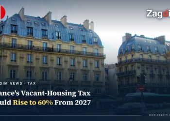 Haussmannian residential apartment buildings at Place Saint-Michel in Paris, illustrating a report that France's vacant-housing tax could rise to 60% from 2027