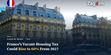 Haussmannian residential apartment buildings at Place Saint-Michel in Paris, illustrating a report that France's vacant-housing tax could rise to 60% from 2027