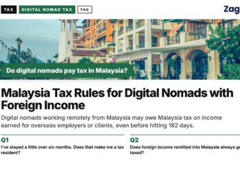 Waterfront promenade with colonial-style buildings and a lighthouse tower, illustrating Malaysia Tax Rules for Digital Nomads with Foreign Income