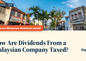 Quiet heritage street with colourful shophouses, Penang, illustrating How Are Dividends From a Malaysian Company Taxed?