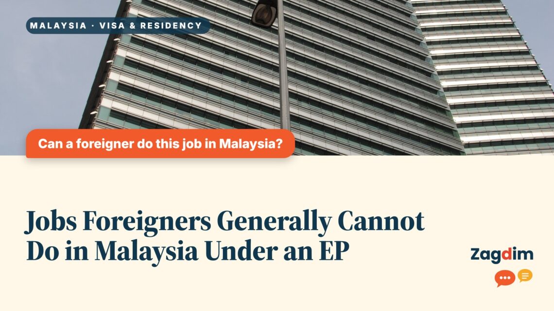 Low angle view of a striped high-rise office tower, illustrating Jobs Foreigners Generally Cannot Do in Malaysia Under an EP