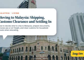 White domed colonial building beside a modern hotel tower, illustrating Moving to Malaysia: Shipping, Customs Clearance and Settling In