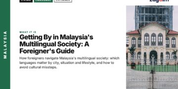 Architecture — white colonial building with modern skyscraper behind, illustrating Getting By in Malaysia's Multilingual Society: A Foreigner's Guide