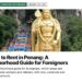 Temple — Batu Caves rainbow steps and golden Lord Murugan statue, illustrating Where to Rent in Penang: A Neighborhood Guide for Foreigners