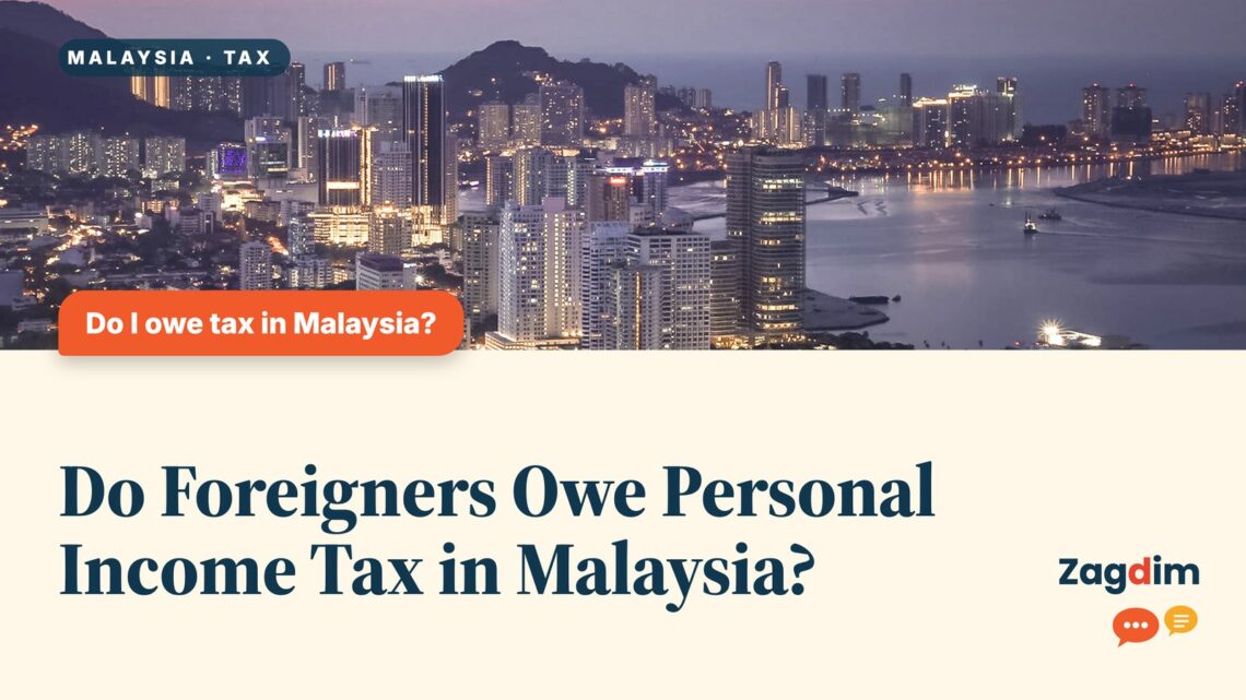 Penang skyline aerial view at dusk with high-rises, illustrating Do Foreigners Owe Personal Income Tax in Malaysia?