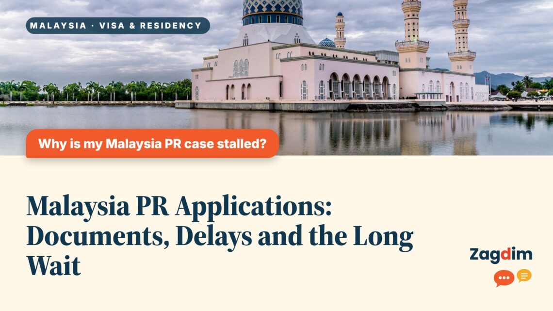 Kota Kinabalu City Mosque reflected in calm water under a cloudy sky, illustrating Malaysia PR Applications: Documents, Delays and the Long Wait