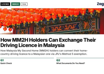 Temple — red lantern pavilion overlooking Kuala Lumpur skyline, illustrating How MM2H Holders Can Exchange Their Driving Licence in Malaysia