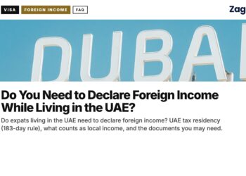 Landmark — Large illuminated DUBAI sign lettering close-up, illustrating Do You Need to Declare Foreign Income While Living in the UAE?