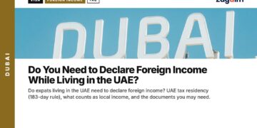 Landmark — Large illuminated DUBAI sign lettering close-up, illustrating Do You Need to Declare Foreign Income While Living in the UAE?