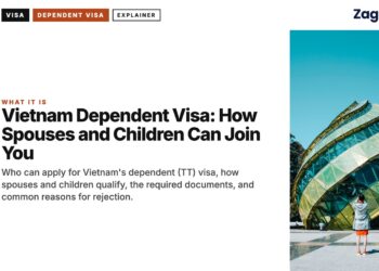 Architecture — Woman photographing curved glass modern building, illustrating Vietnam Dependent Visa: How Spouses and Children Can Join You