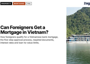 Harbour — Small cruise ship crossing calm Ha Long Bay, illustrating Can Foreigners Get a Mortgage in Vietnam?
