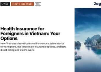 Aerial — Ha Long Bay karst islands with boats, illustrating Health Insurance for Foreigners in Vietnam: Your Options