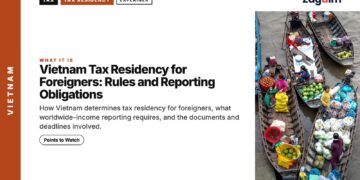 Market — Vendors on boats loaded with market produce, illustrating Vietnam Tax Residency for Foreigners: Rules and Reporting Obligations