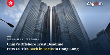Upward view of Exchange Square's twin towers in Central, Hong Kong, home of the Hong Kong Stock Exchange, illustrating a story on China's offshore trust tax deadline and US tax exposure for Hong Kong asset holders