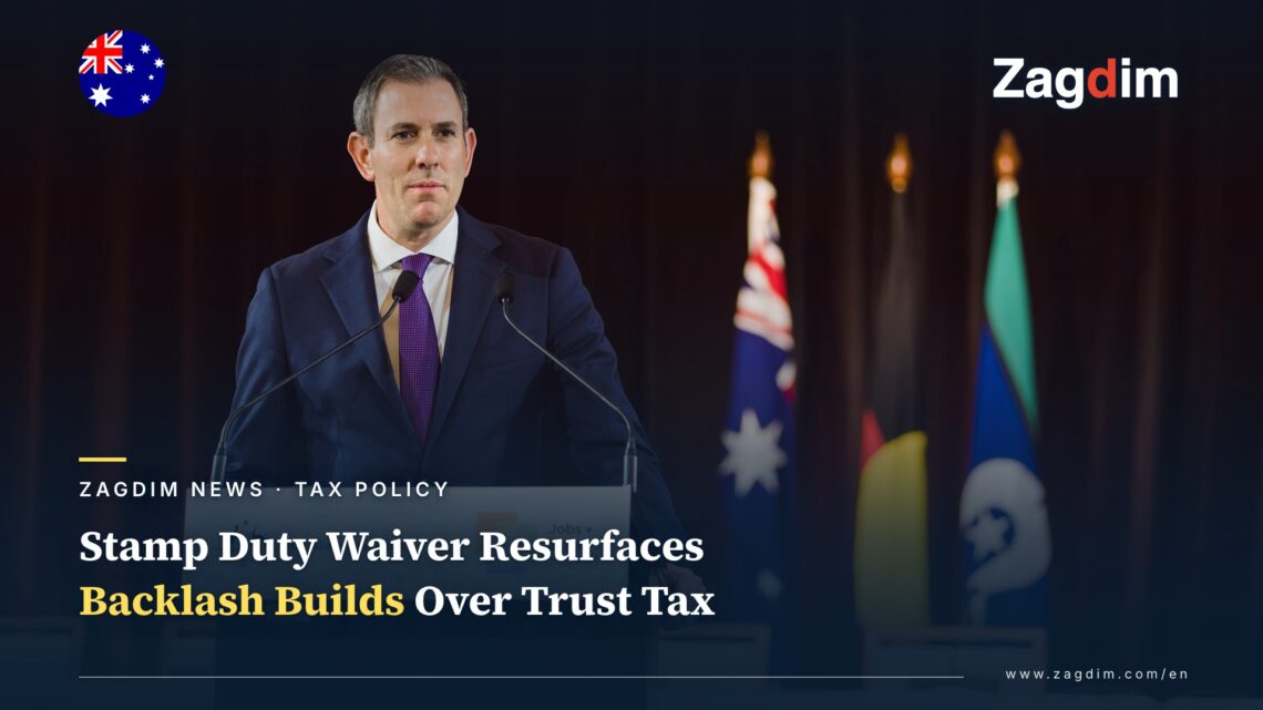 Australian Treasurer Jim Chalmers speaking at a lectern marked Australian Government, with the Australian flag behind him