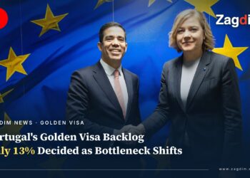 Portugal's Minister of the Presidency Antonio Leitao Amaro shaking hands with EU Commissioner Henna Virkkunen, EU flag backdrop