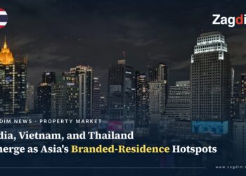 Bangkok's Sukhumvit skyline at night, representing Thailand's branded-residence property boom