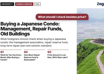 Aerial view of grassy hill path above farmland, illustrating Buying a Japanese Condo: Management, Repair Funds, Old Buildings