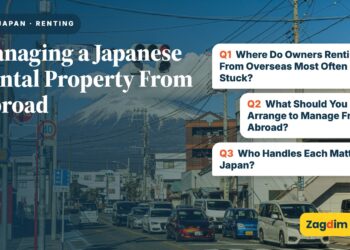 Local street with Mount Fuji rising behind rooftops, illustrating Managing a Japanese Rental Property From Abroad