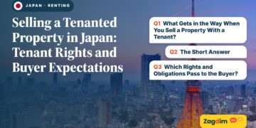 Tokyo Tower illuminated at dusk over skyline, illustrating Selling a Tenanted Property in Japan: Tenant Rights and Buyer Expectations