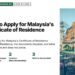 Waterfront promenade with colonial-style buildings and a lighthouse tower, illustrating How to Apply for Malaysia's Certificate of Residence (COR)