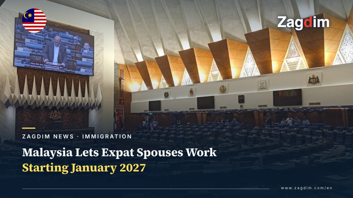 Interior of Malaysia's Dewan Rakyat parliamentary chamber, members' benches and debate screen