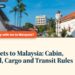 Colonial-era building along a palm-lined Penang street, illustrating Flying Pets to Malaysia: Cabin, Checked, Cargo and Transit Rules
