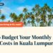 Tall palm trees against a blue sky, illustrating How to Budget Your Monthly Living Costs in Kuala Lumpur