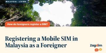 Natural cave opening framed by rock with greenery beyond, illustrating Registering a Mobile SIM in Malaysia as a Foreigner