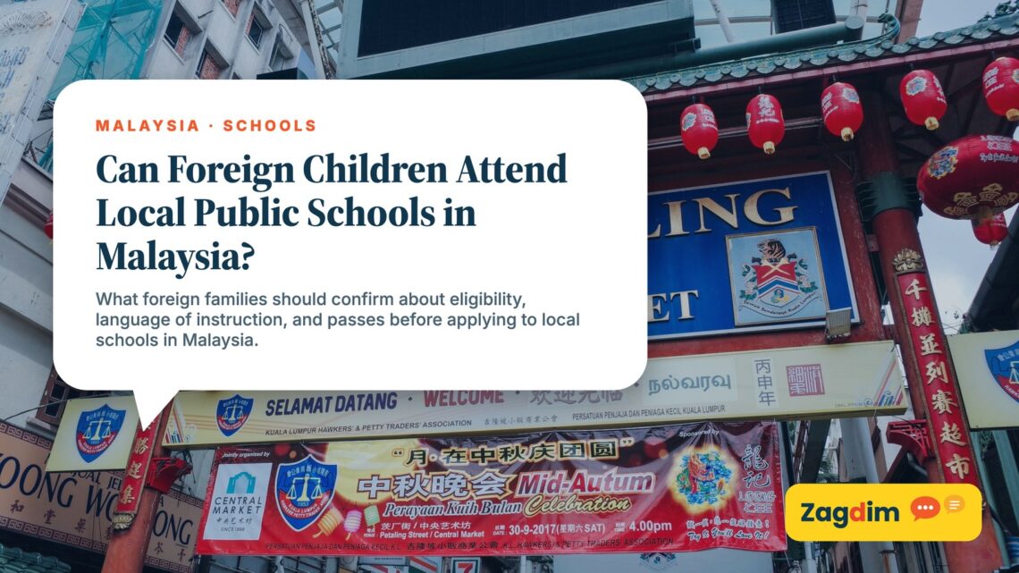 Petaling Street gate entrance decorated with red lanterns, illustrating Can Foreign Children Attend Local Public Schools in Malaysia?