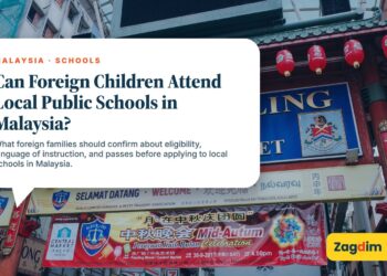 Petaling Street gate entrance decorated with red lanterns, illustrating Can Foreign Children Attend Local Public Schools in Malaysia?