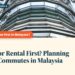 Upward view of a single Petronas Tower, illustrating School or Rental First? Planning Family Commutes in Malaysia