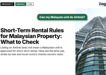Upward view of a single Petronas Tower, illustrating Short-Term Rental Rules for Malaysian Property: What to Check