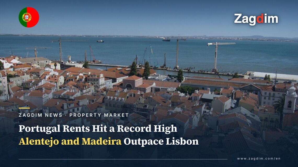 Red-tiled rooftops of Lisbon's Alfama district overlooking the Tagus river, Portugal rents hit record high