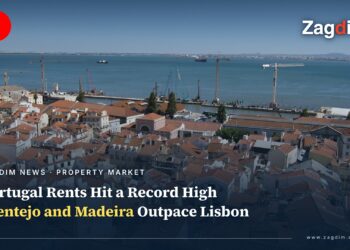 Red-tiled rooftops of Lisbon's Alfama district overlooking the Tagus river, Portugal rents hit record high