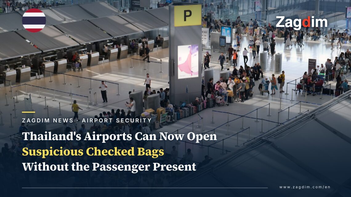 Passengers queue with luggage at the international check-in area of Bangkok's Suvarnabhumi Airport