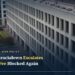 Aerial view of the US Department of Labor's Frances Perkins Building headquarters with article title overlay