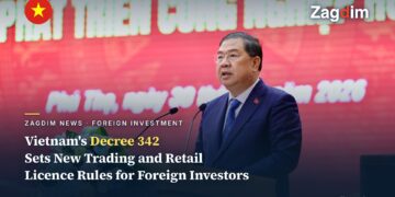 Vietnam's Standing Deputy Prime Minister Pham Gia Tuc speaking at an official event, illustrating the news of Decree 342 easing foreign-investor trading and retail licensing rules
