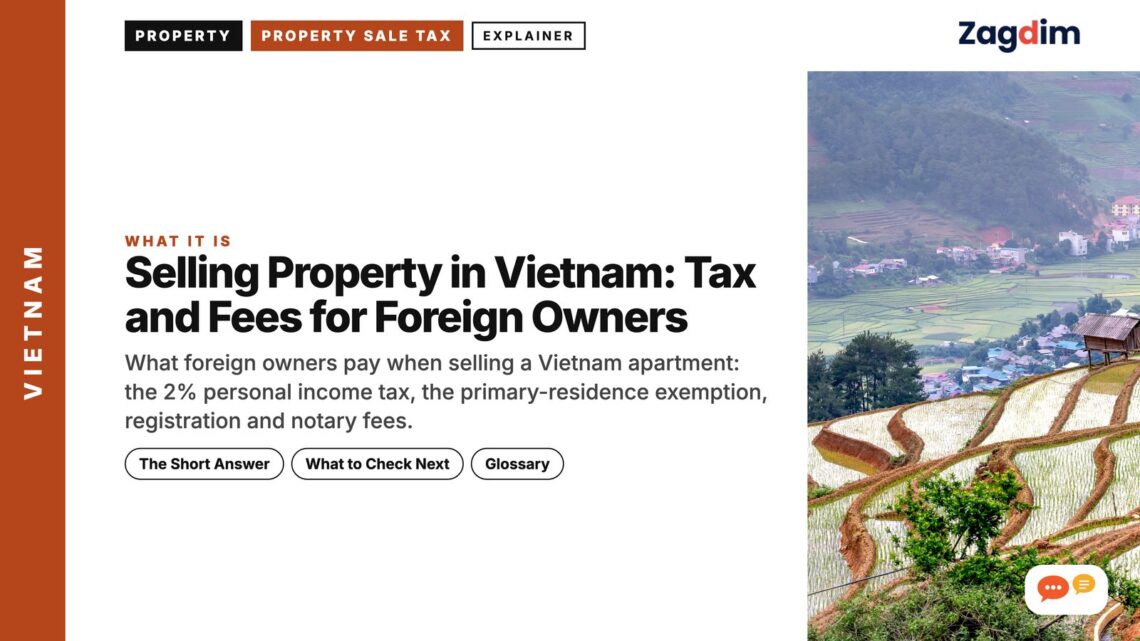Aerial view of terraced rice fields and village in a valley, illustrating Selling Property in Vietnam: Tax and Fees for Foreign Owners