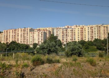 Mid-rise apartment blocks on a hillside on the outskirts of Lisbon