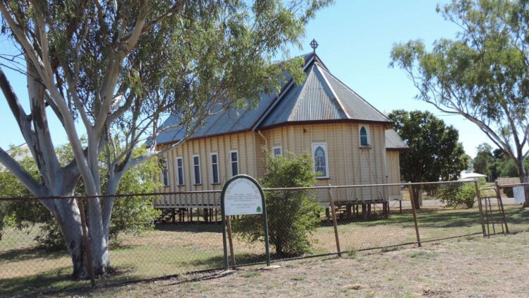Small timber Anglican church in the regional Queensland outback town of Aramac, one of the towns named in the story's regional-yields example